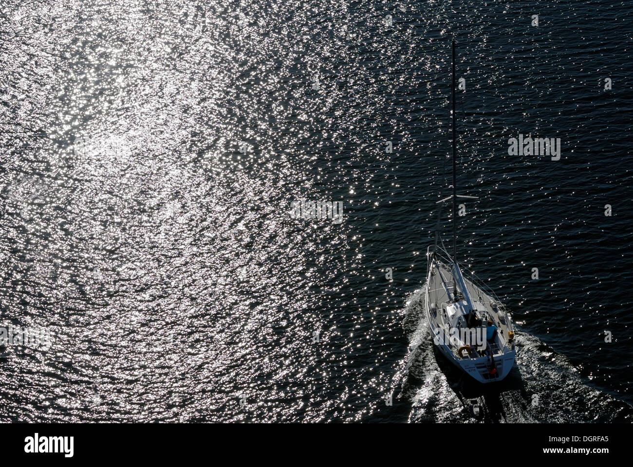 Sailboat running towards the sun, aerial view, Kiel Canal, Kiel, Schleswig-Holstein Stock Photo