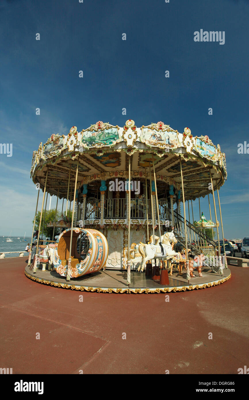 Old-fashioned children's roundabout, carousel, Arcachon, Bordeaux, France, Europe Stock Photo