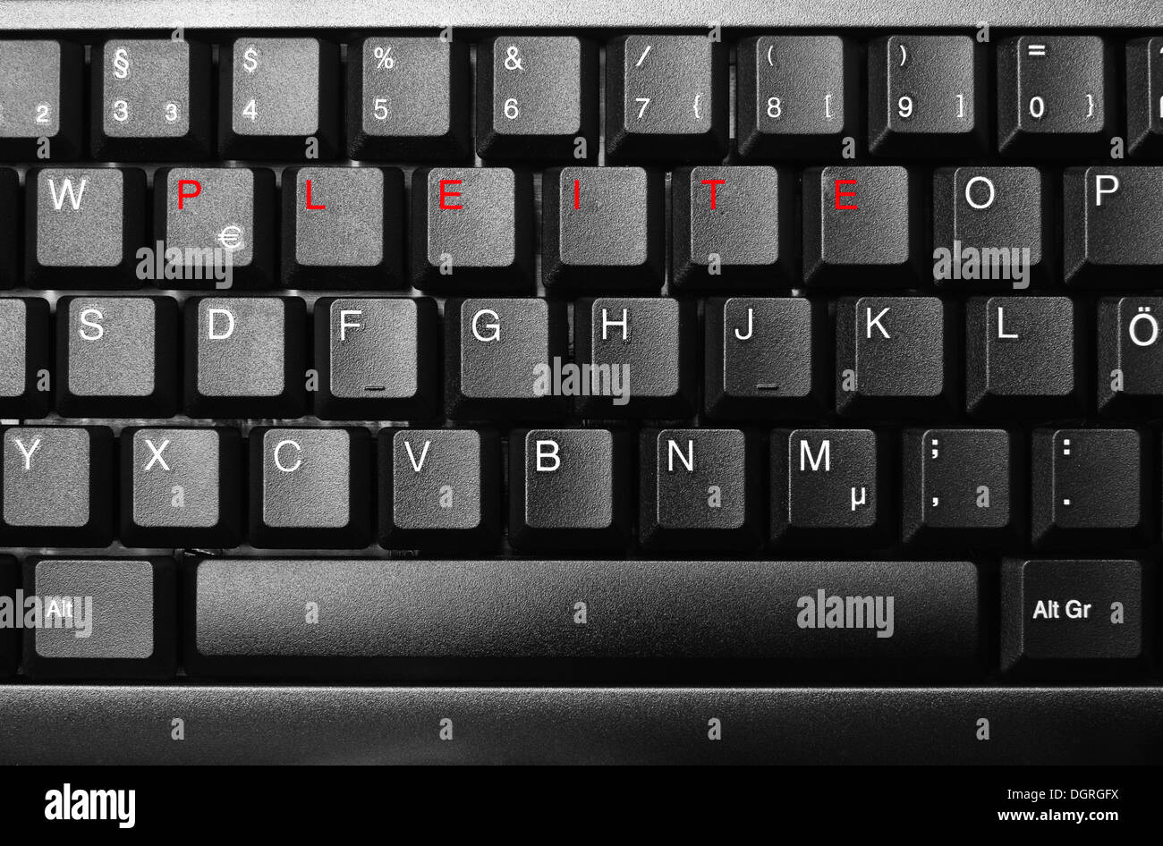 Keyboard with lettering 'Pleite', bankrupcy in red Stock Photo