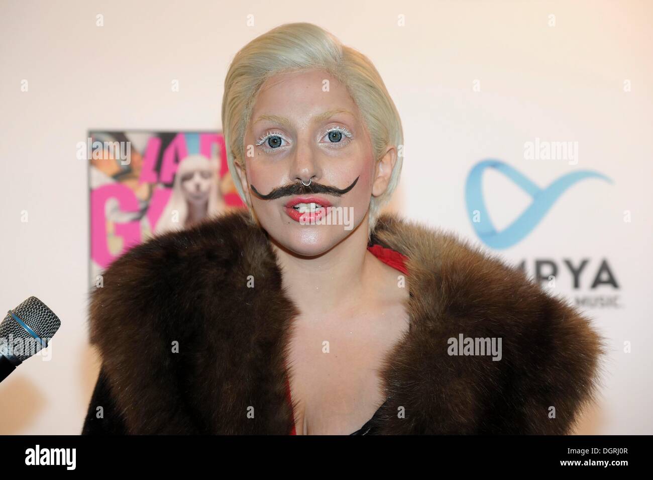 Lady GaGa donned a fake mustache and hosted a listening party to