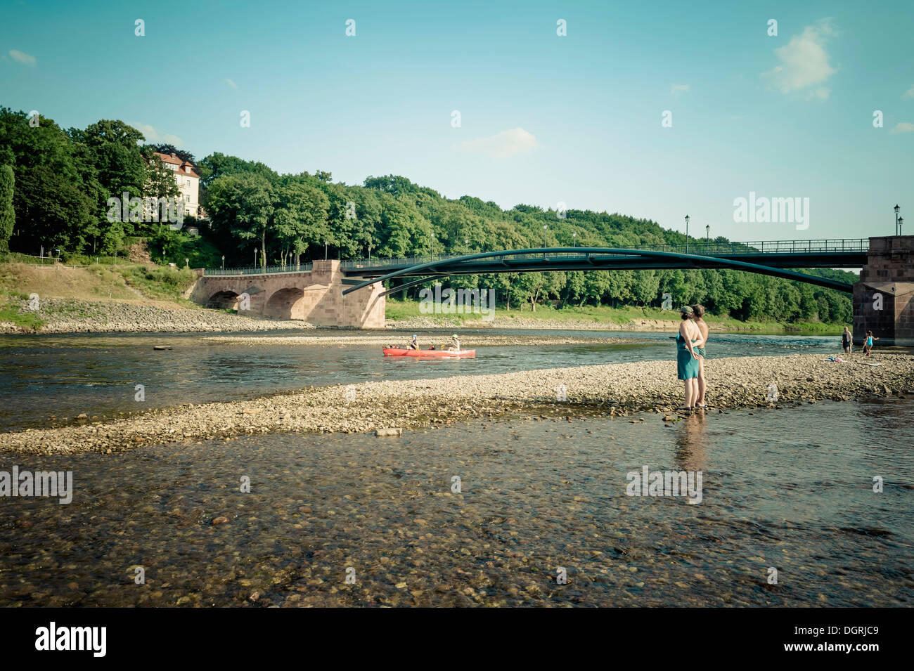 Germany, Saxony, Grimma, Poppelmann Bridge with people at Mulde Stock Photo