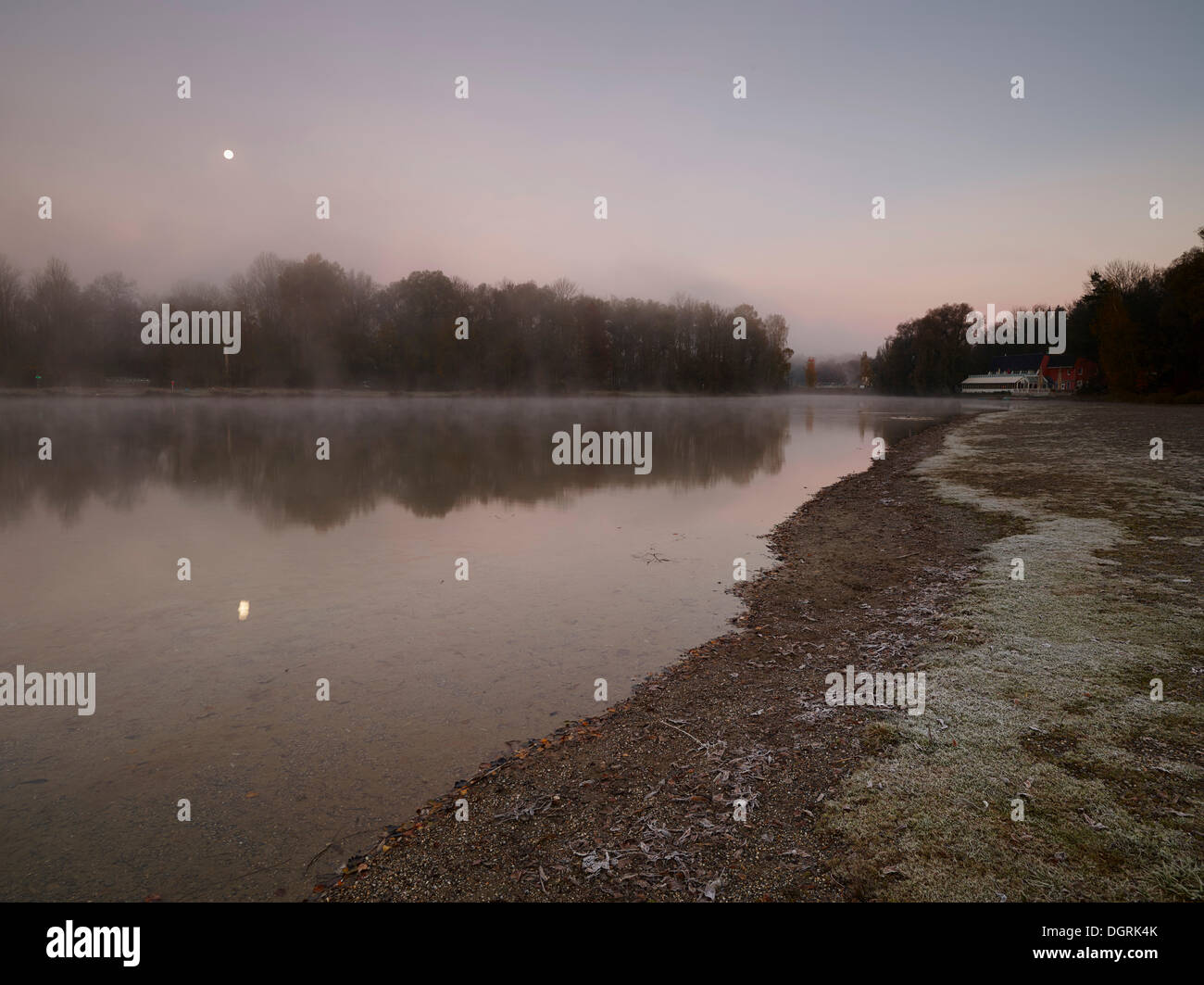 Early morning mood at Kuhsee lake with a view towards Hochablass wier, Augsburg, Swabia, Bavaria Stock Photo