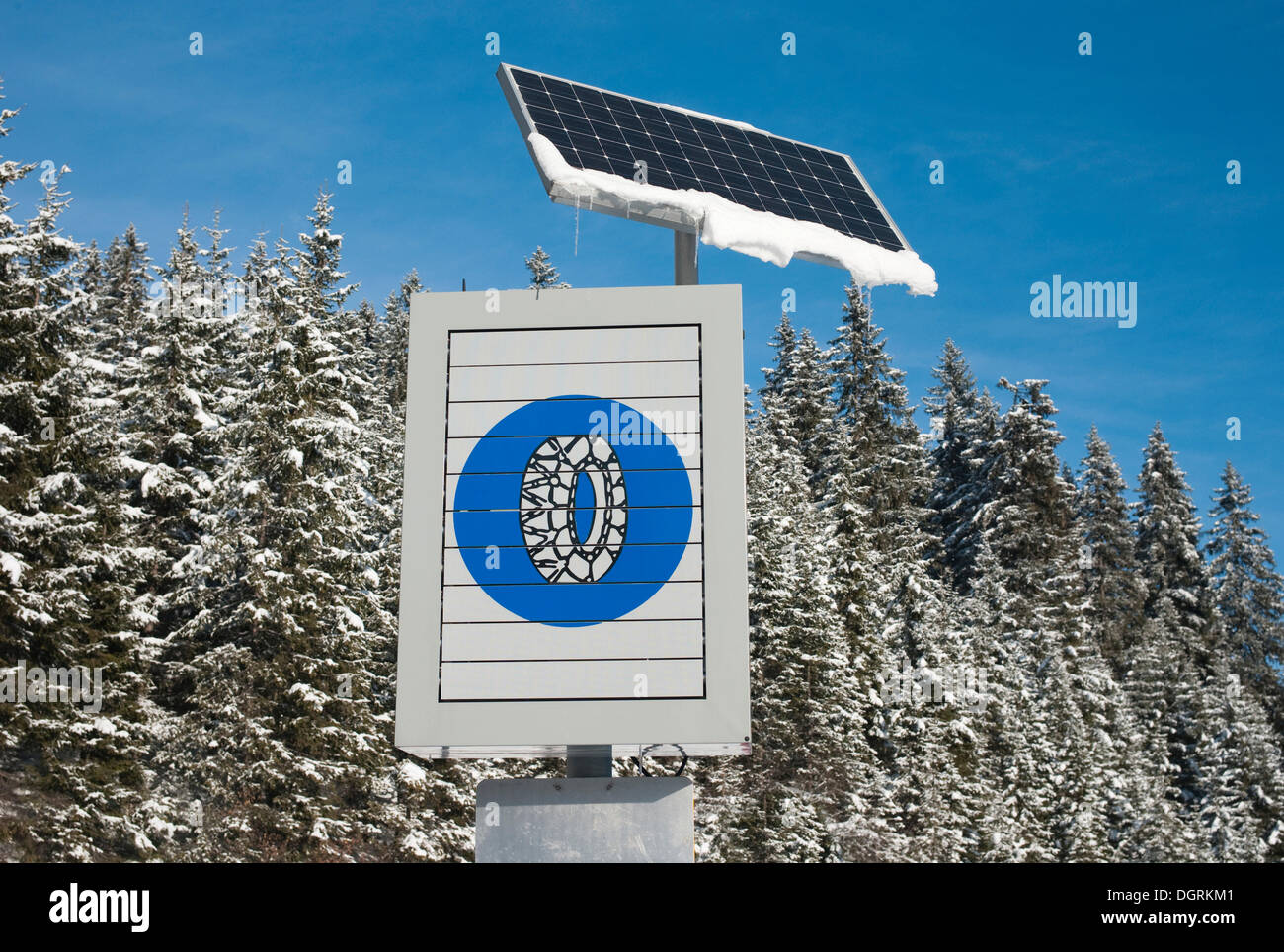 Solar-powered traffic sign indicating the use of snow chains, Tyrol, Austria, Europe Stock Photo