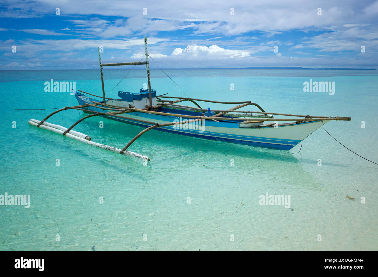 Banka, traditional Philippine outrigger boat off the beach, Malapascua, Philippines, Asia Stock Photo