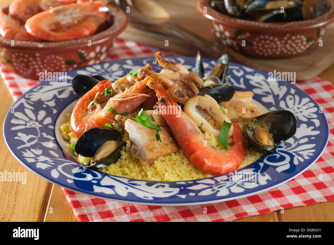 Couscous alla Trapanese. Sicilian seafood couscous Stock Photo