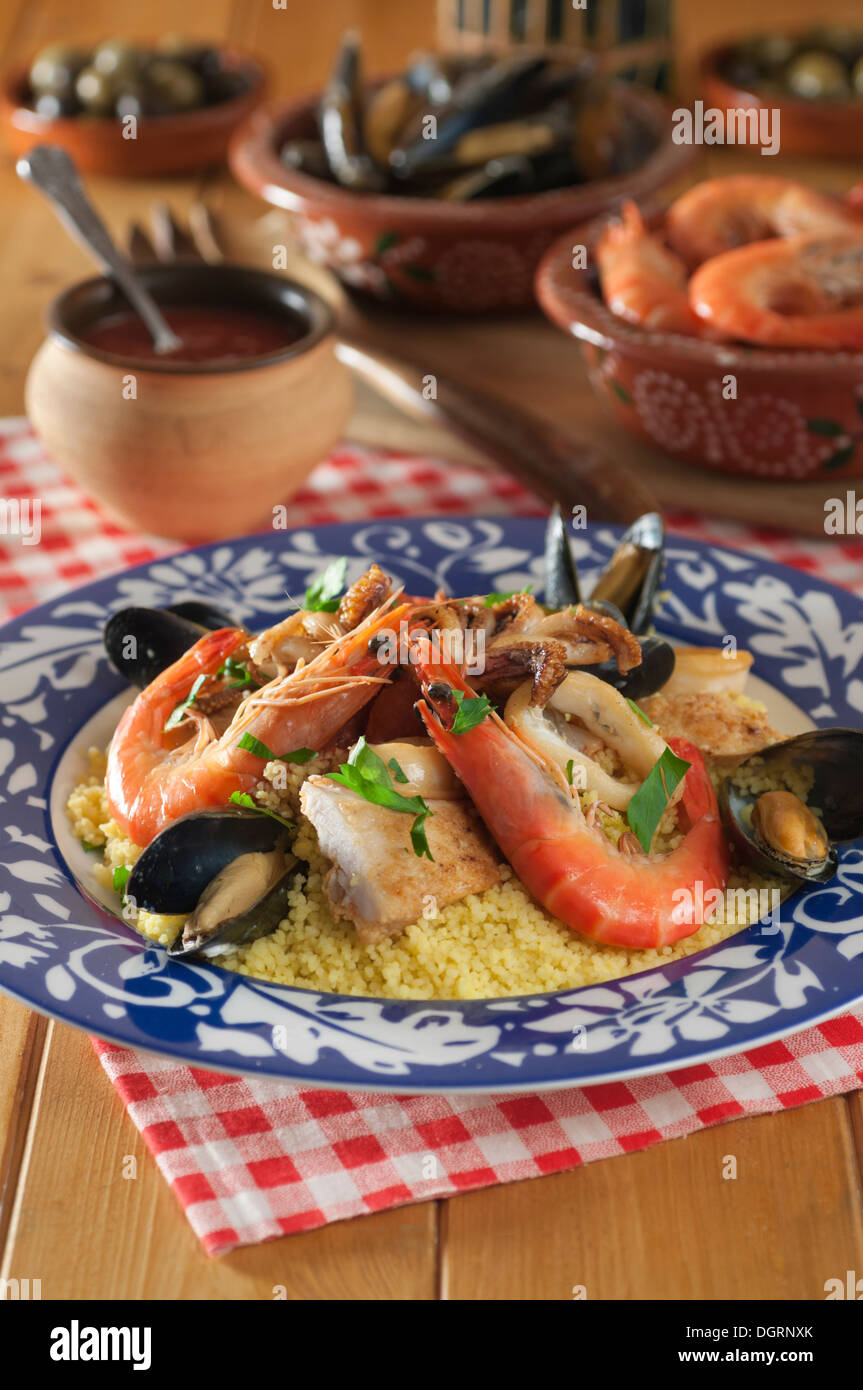 Couscous alla Trapanese. Sicilian seafood couscous Stock Photo