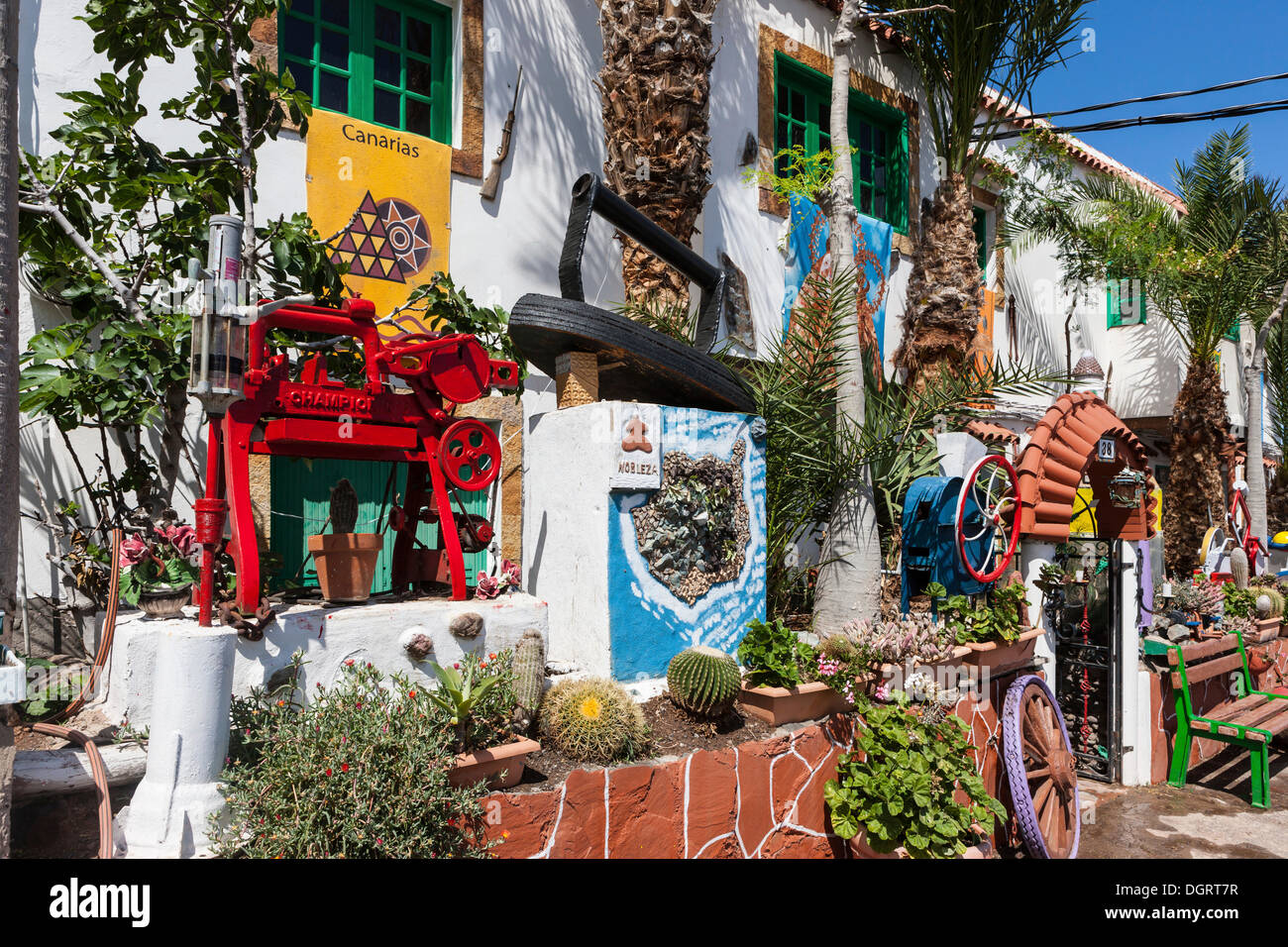 House with painted flotsam and jetsam, stranded goods, near Las