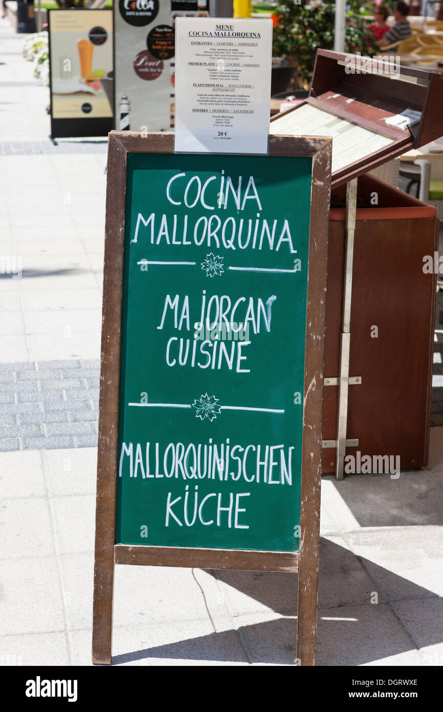Sign of a restaurant serving typical Majorcan cuisine, outdoor restaurant, promenade, Cala Sant Vicenç, Pollença Stock Photo
