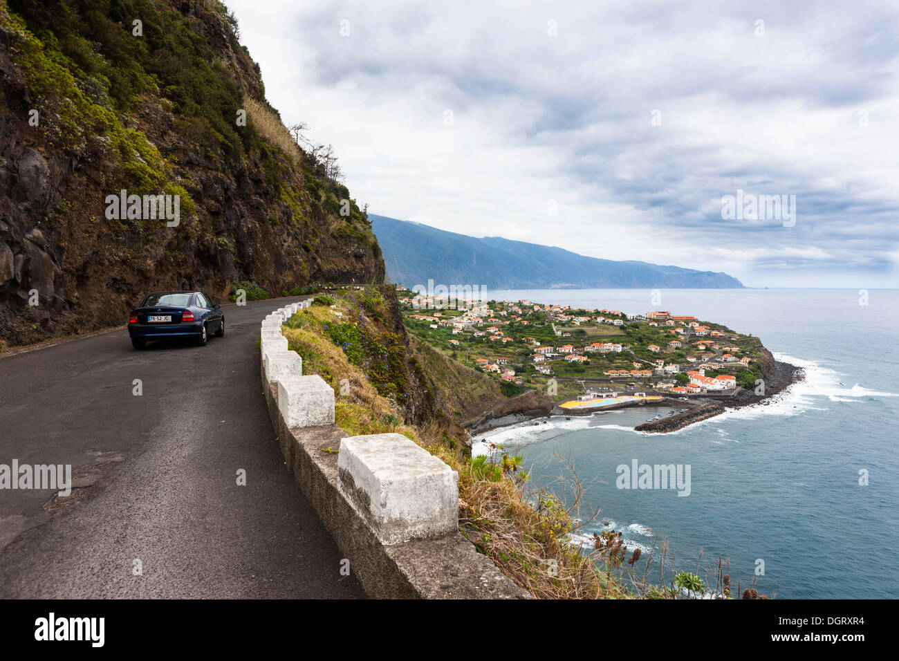 Road along the coastal cliffs near Ponta Delgada, Vicente, Boaventura, Madeira, Portugal Stock Photo