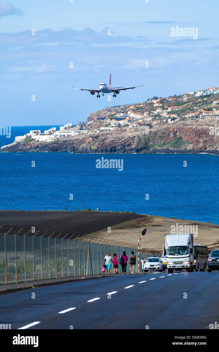 Airbus from TAP Portugal approaching the runway of Madeira Airport, LPMA, also known as Funchal Airport and Santa Catarina Stock Photo