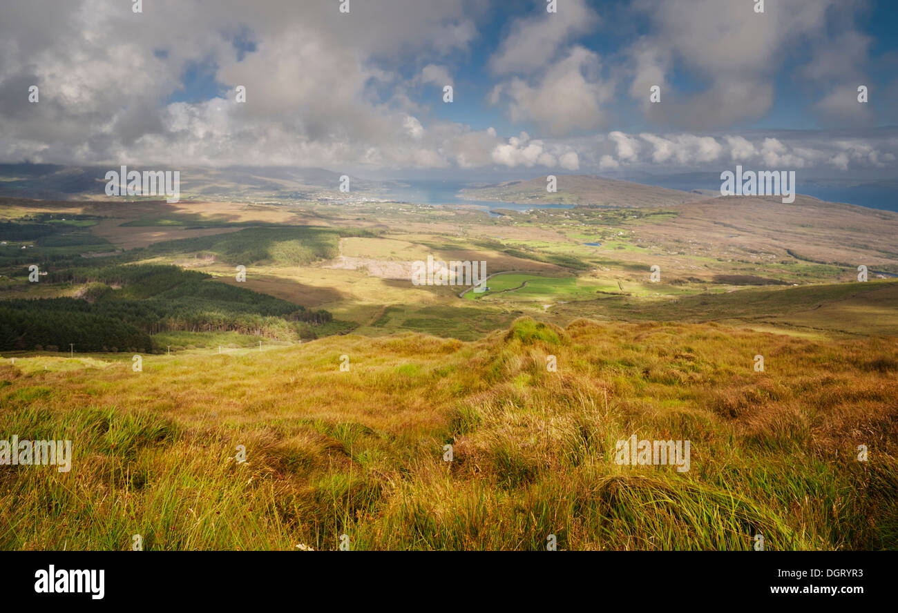 Looking towards Bantry Bay, Bere Island and Castletownbere from the top of Knockoura Mountain, Beara, County Cork, Ireland Stock Photo