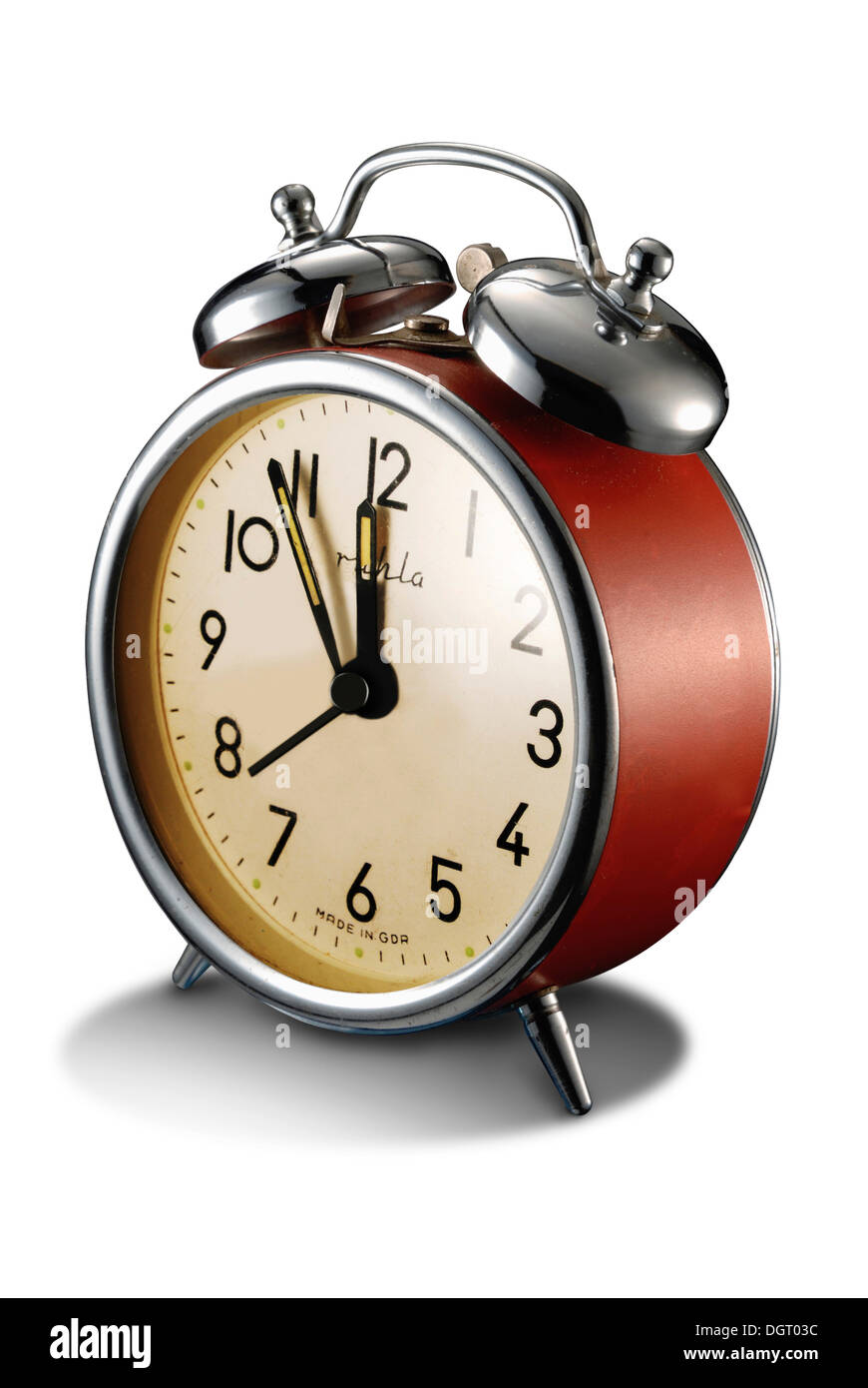 Alarm clock, showing five minutes to twelve Stock Photo Alamy