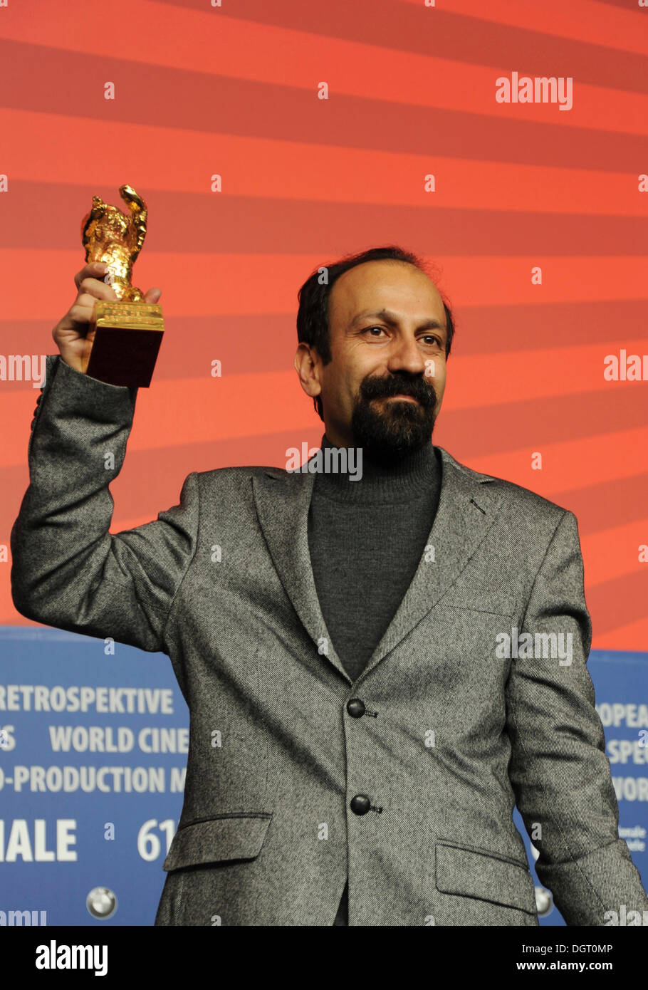 Asghar Farhadi holding the Golden Bear for Best Film ofr 'Nader and Simin: a separation', at the press conference for the awards Stock Photo