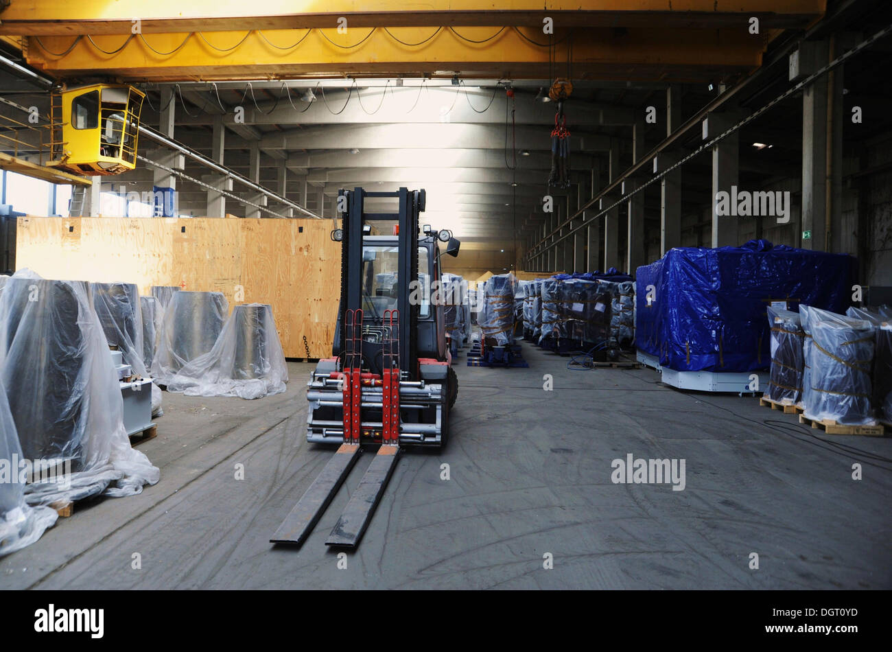 Warehouse with palettes to be transported by forklift truck or crane onto trucks or ships, Nuremberg, Bavaria Stock Photo