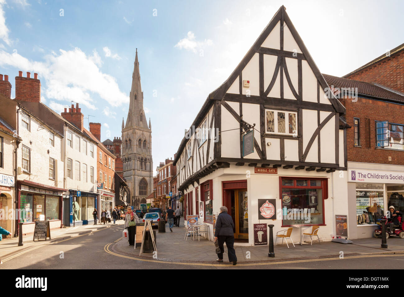 Old English town street scene. A view along Kirkgate towards St Mary Magdalene Church, Newark on Trent, Nottinghamshire, England, UK Stock Photo