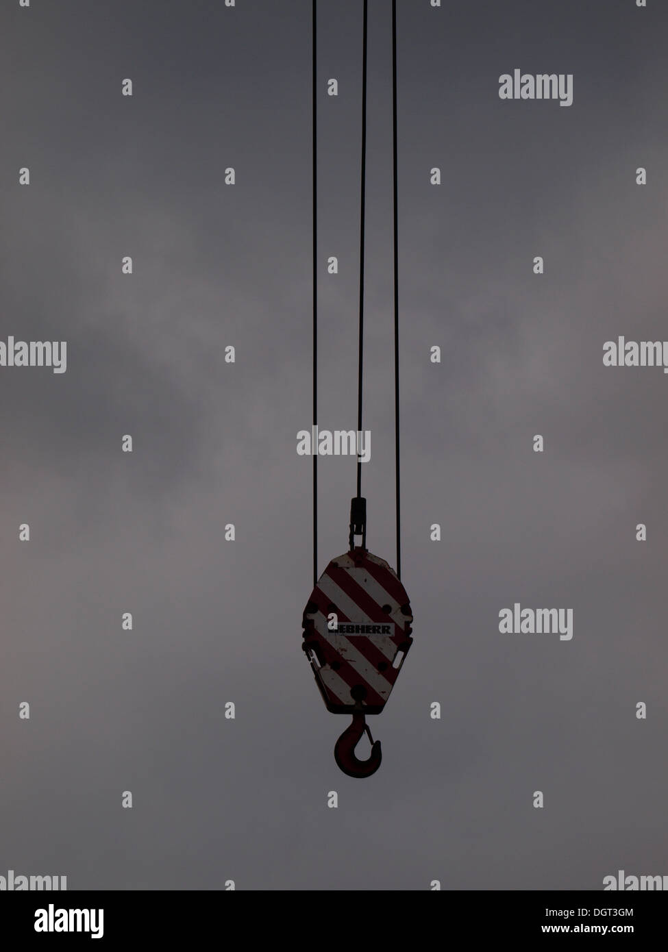 Hook of a construction crane on a grey day, UK Stock Photo