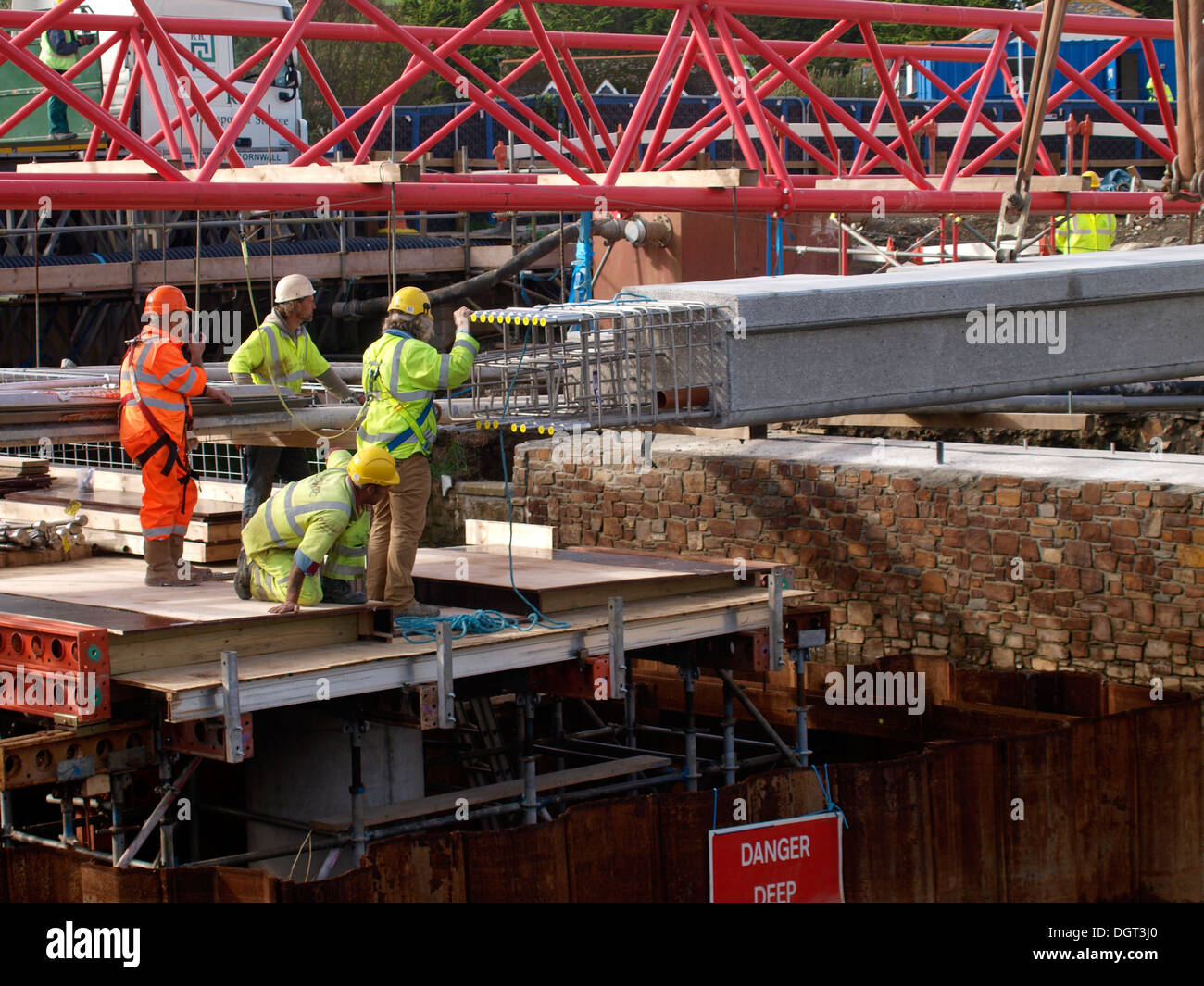 Construction workers put in new bridge, Bude, Cornwall, UK Stock Photo