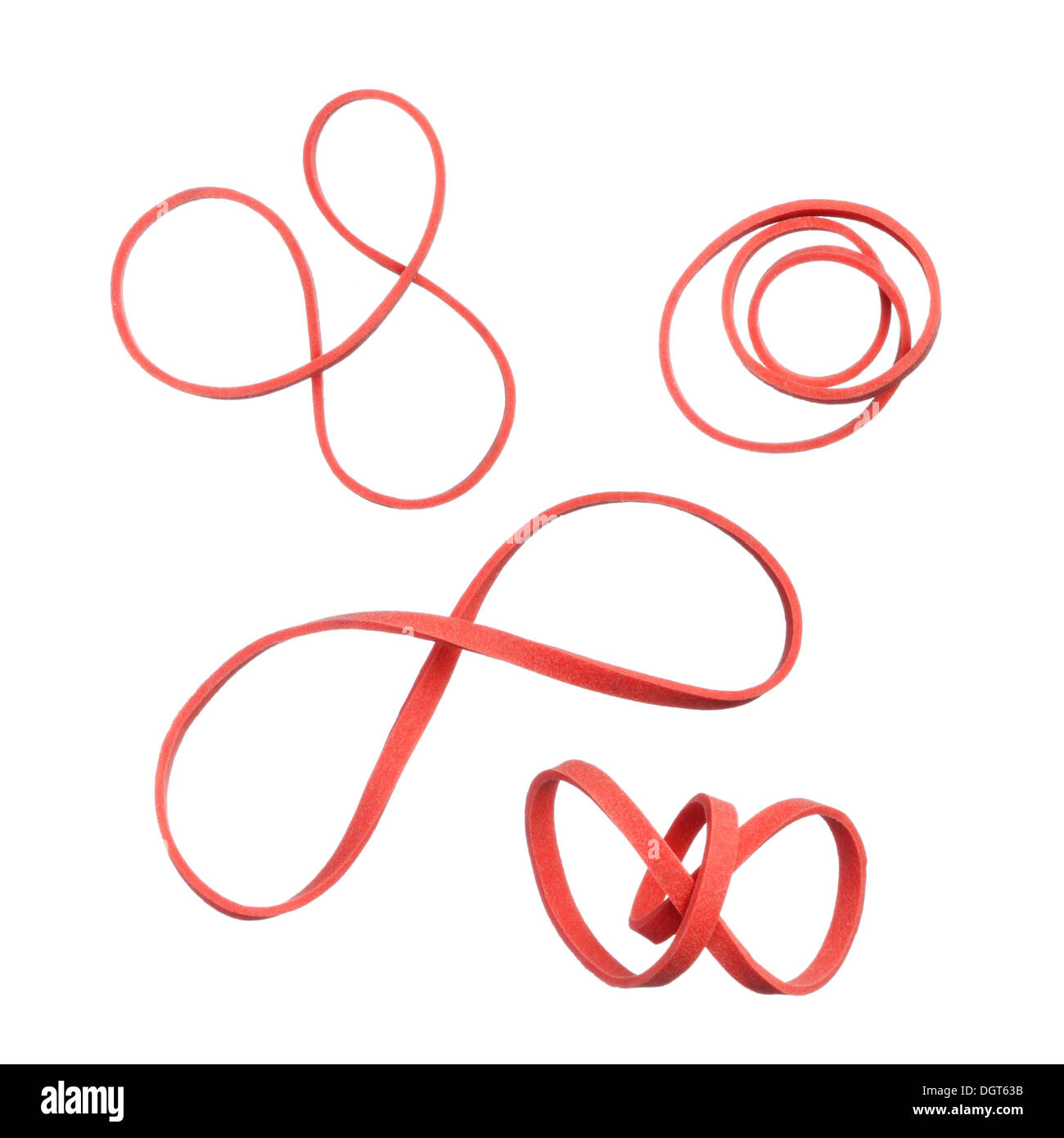 Twisted red elastic rubber bands isolated on white background Stock Photo