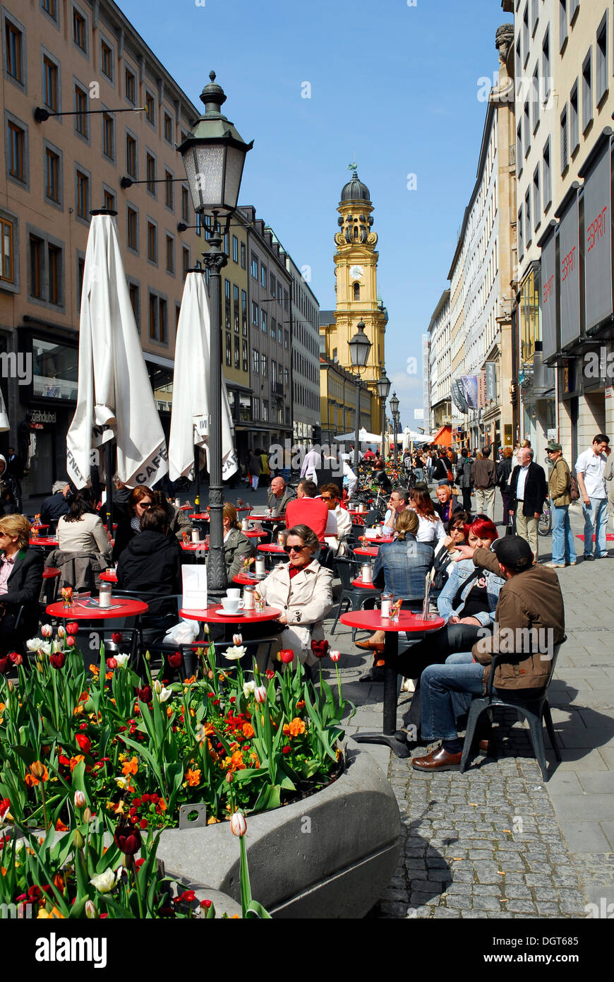 Bar, coffeehouse and restaurant, terrace in the Theatinerstrasse street, in the back the Theatinerkirche church, old town Stock Photo