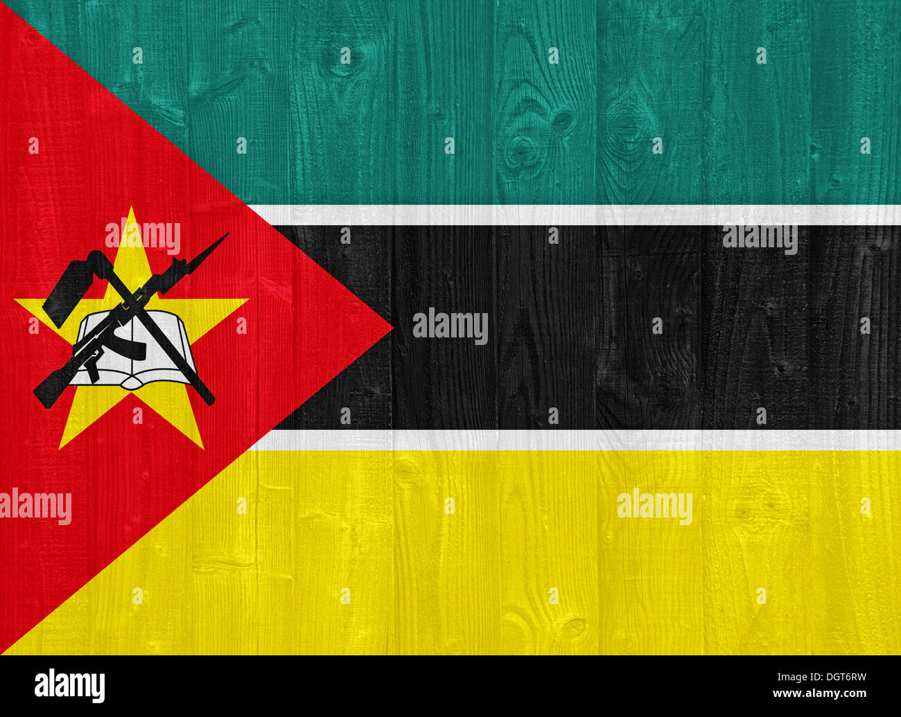 gorgeous Mozambique flag painted on a wood plank texture Stock Photo