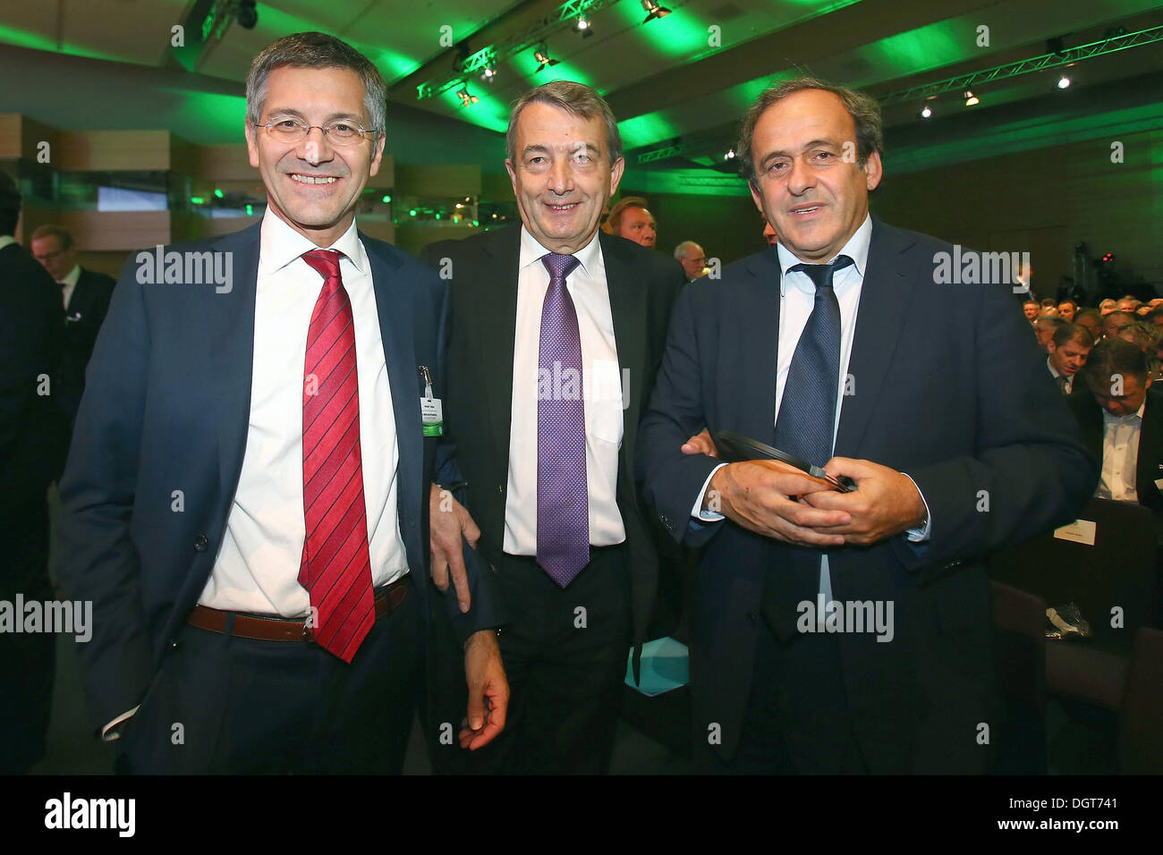 Adidas chairman Herbert Hainer (L-R), DFB president Wolfgang Niersbach and UEFA president Michel Platini pose prior to the DFB Bundestag  at the NCC Nuremberg in Nuremberg, Germany, 24 October 2013. Photo: MARTIN ROSE Stock Photo