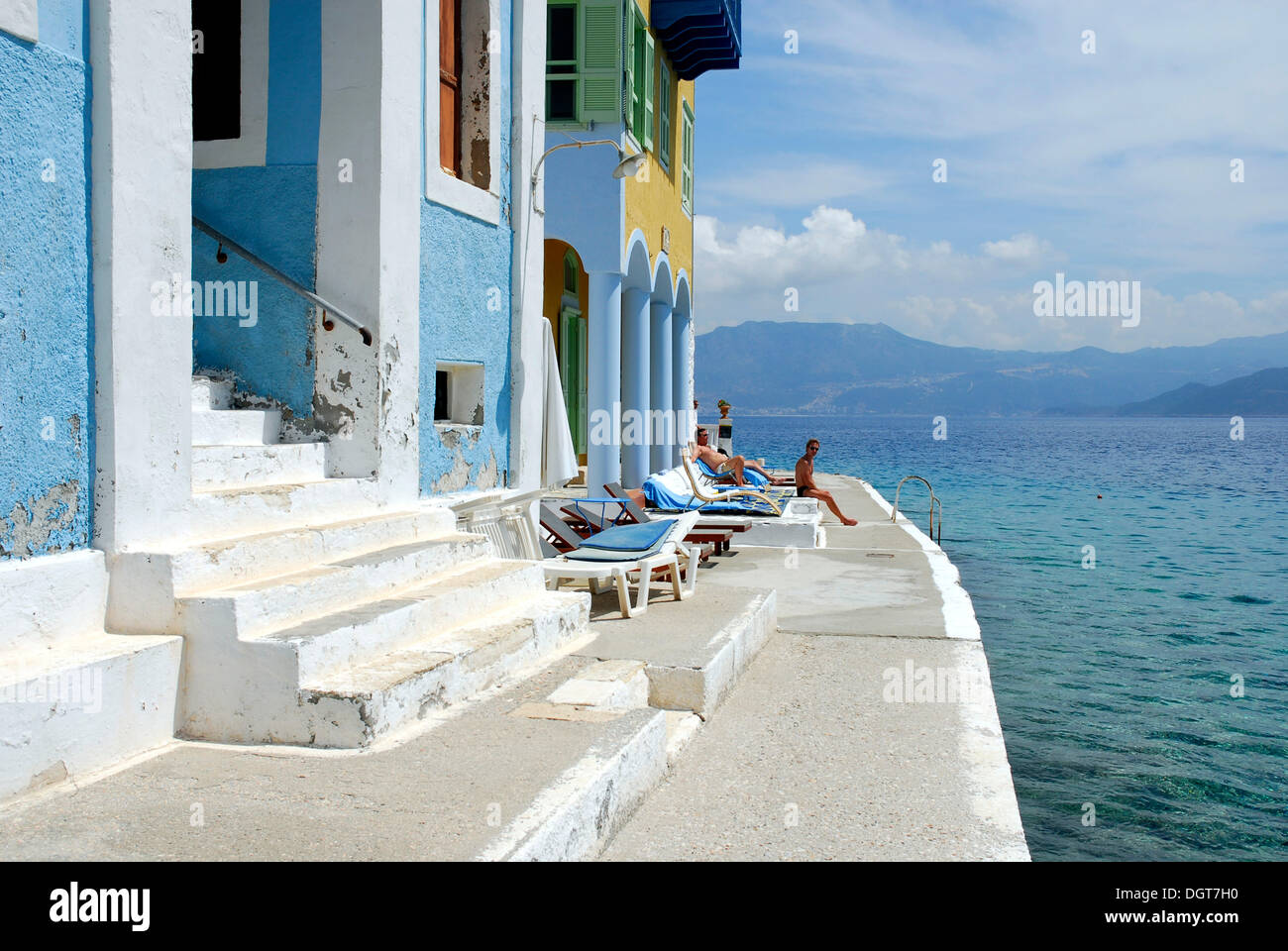Steps, houses on the waterside, town Megisti on Kastelorizo island, Meis, Dodecanese Islands, Aegean, Mediterranean, Greece Stock Photo