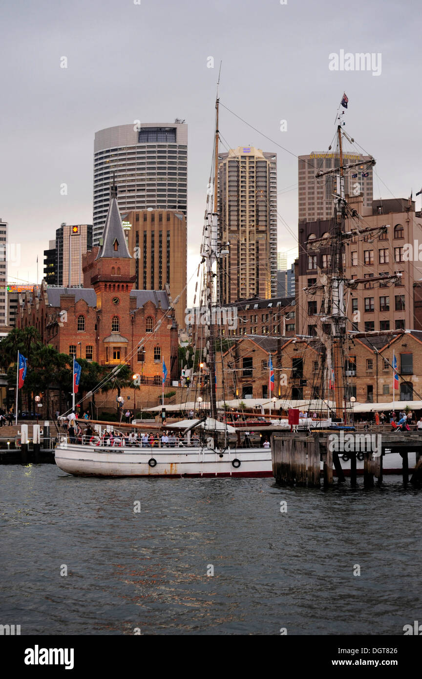 Historic sailing ship entering Campbell's Cove, The Rocks, Sydney Harbour, Sydney, New South Wales, NSW, Australia Stock Photo