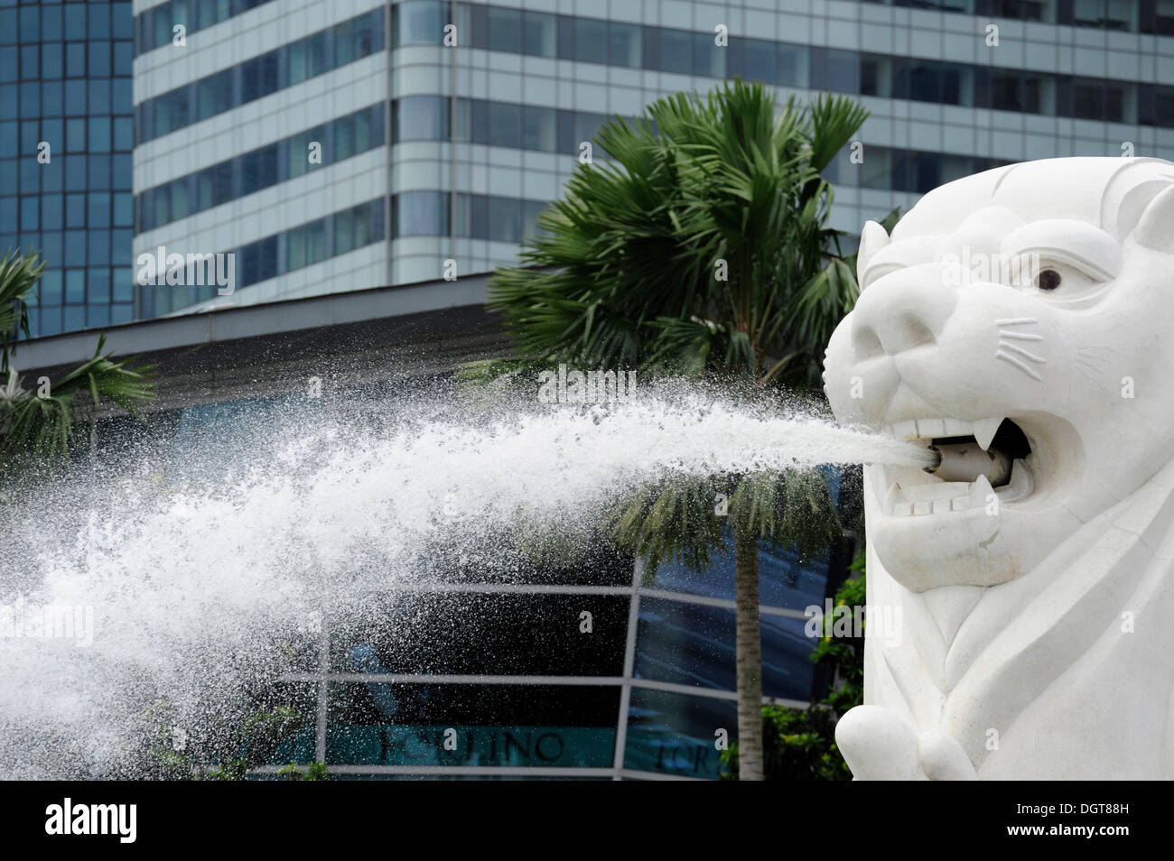 Merlion, a mythical creature spitting water, symbol of the city in Merlion Park, Central Area, Central Business District Stock Photo