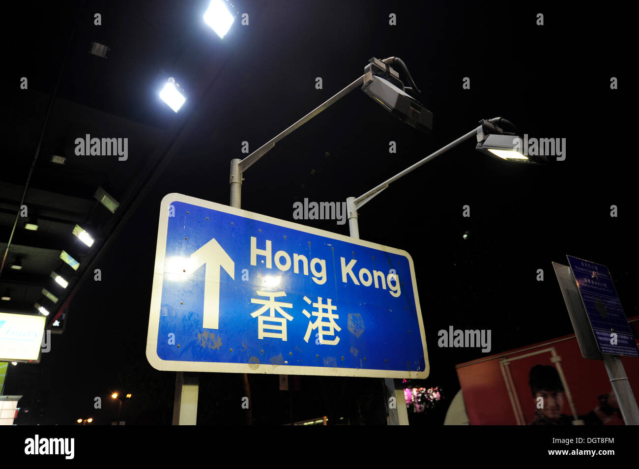 Traffic sign, lettering 'Hong Kong', in Tsim Sha Tsui at night, Kowloon, Hong Kong, China, Asia Stock Photo