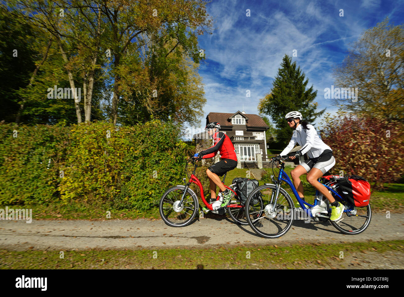 Cyclists riding electric bicycles, Matzing, Lake Waller, Neumarkt, Salzburg Lake District, Salzburg, Austria, Europe Stock Photo