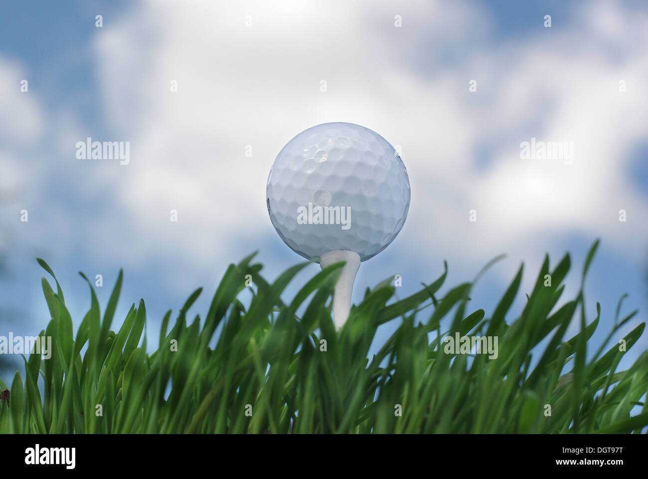the golf ball on background of sky from clouds Stock Photo