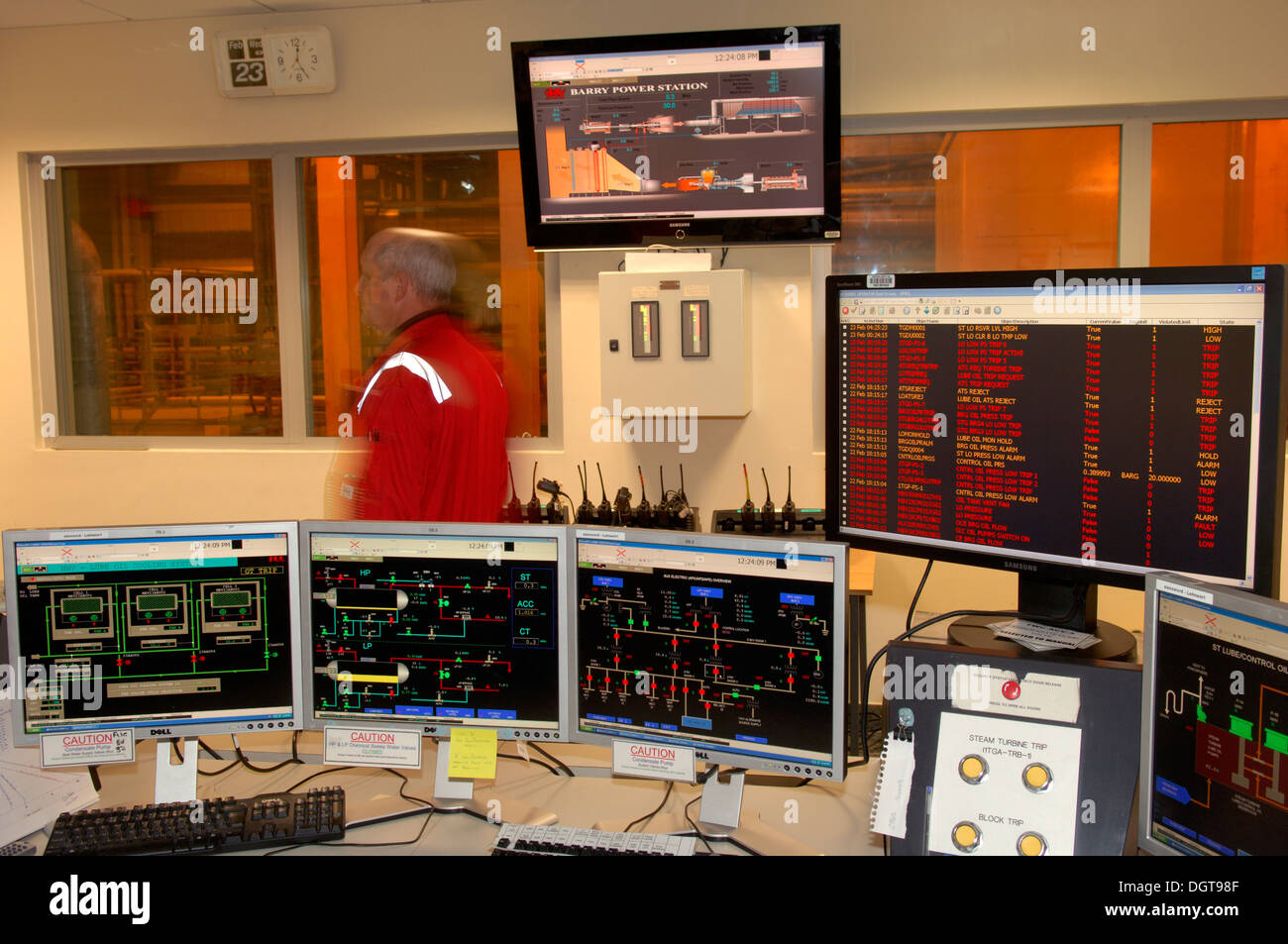 Control Room, with technition walking through. Barry Power Station owned by Centrica. Stock Photo