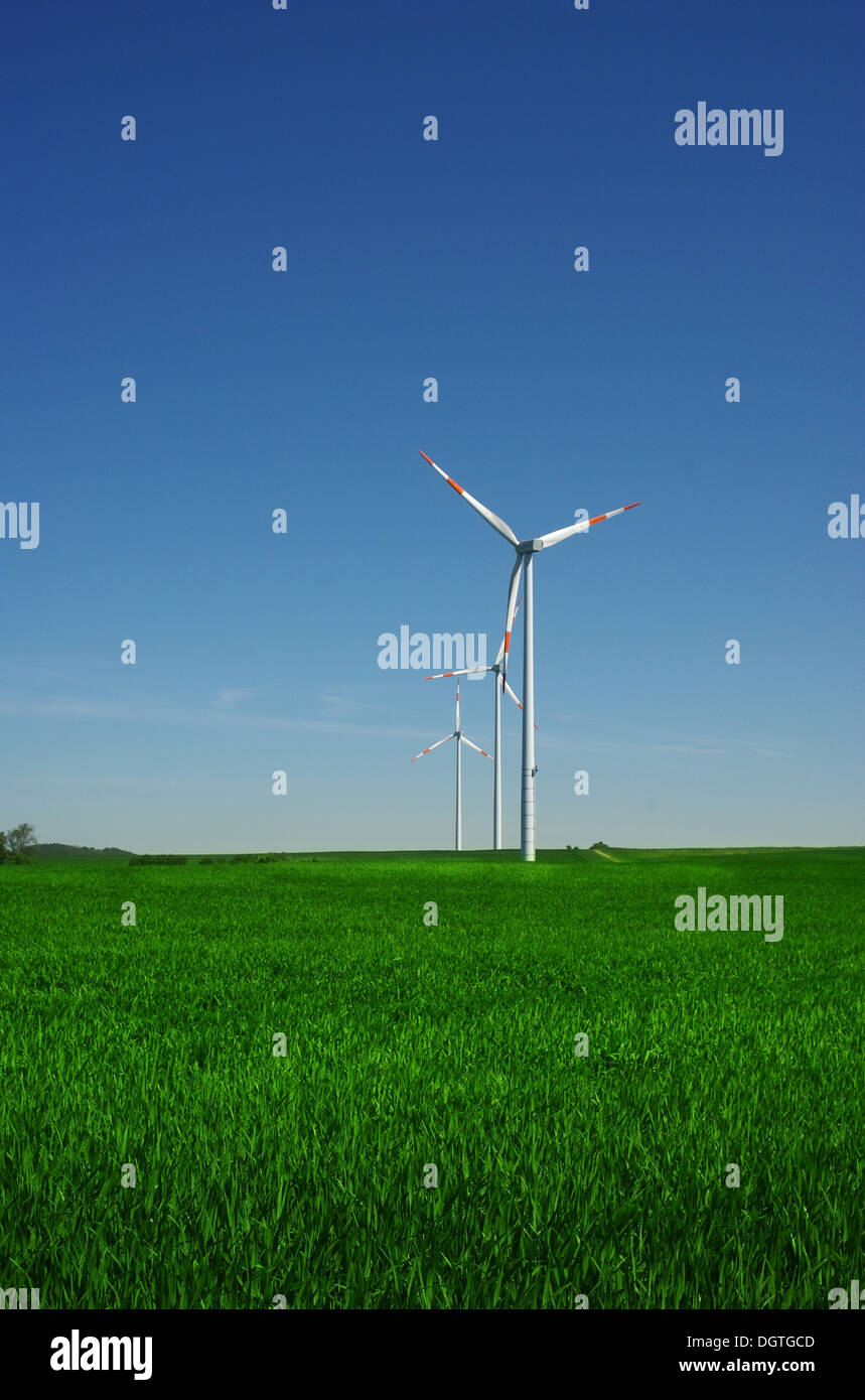 wind turbine on blue sky background Stock Photo - Alamy