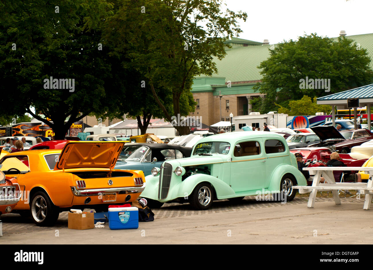 classic and restored cars packed into a parking area at the syracuse