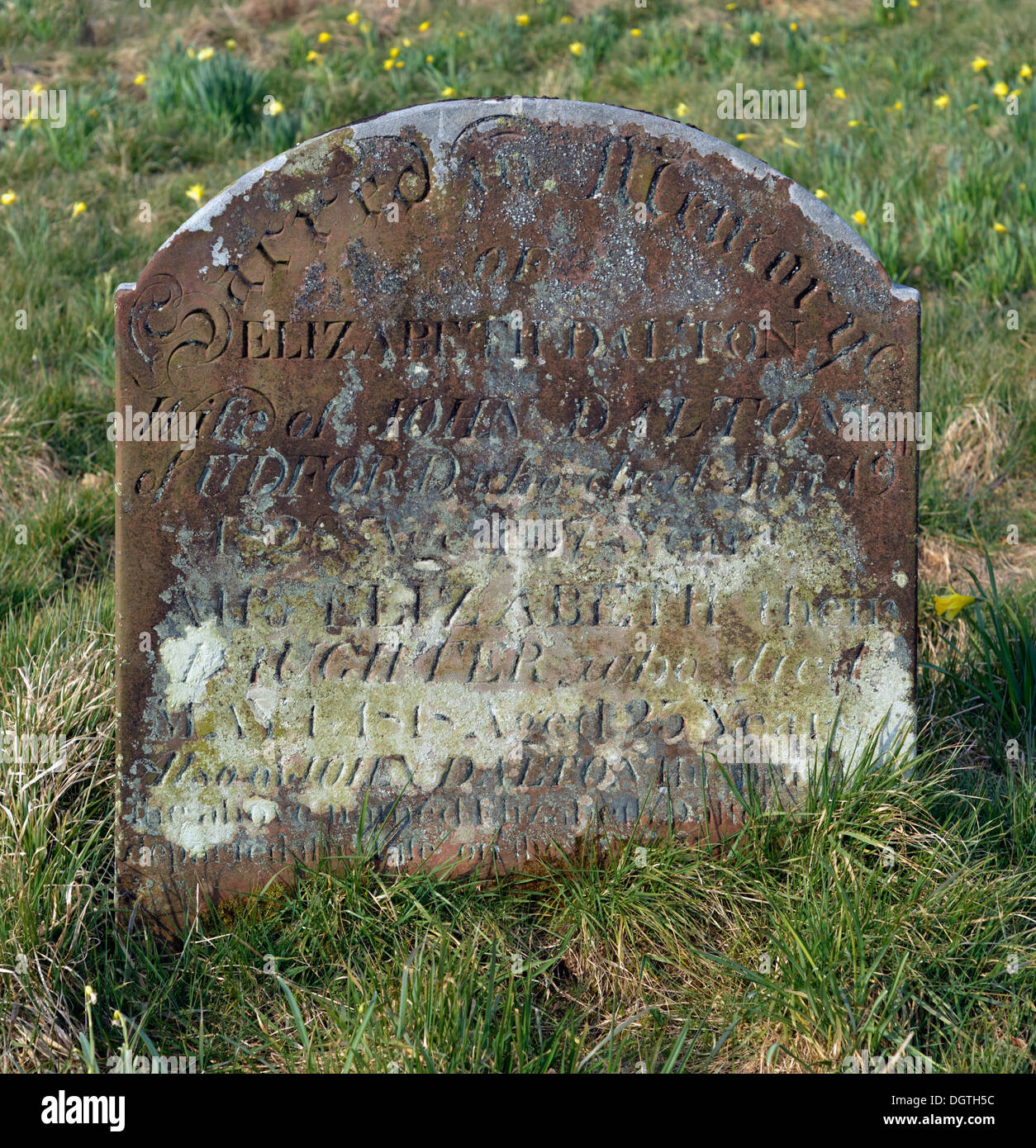 19th.century gravestone with lichen. Church of Saint Cuthbert. Edenhall, Cumbria, England, United Kingdom, Europe. Stock Photo