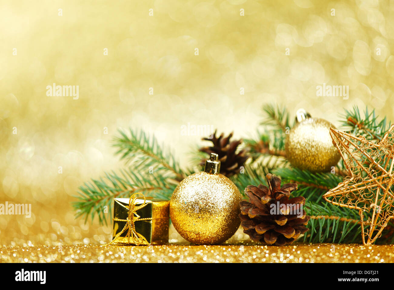 New year card with fir branch, decoration and gifts Stock Photo - Alamy