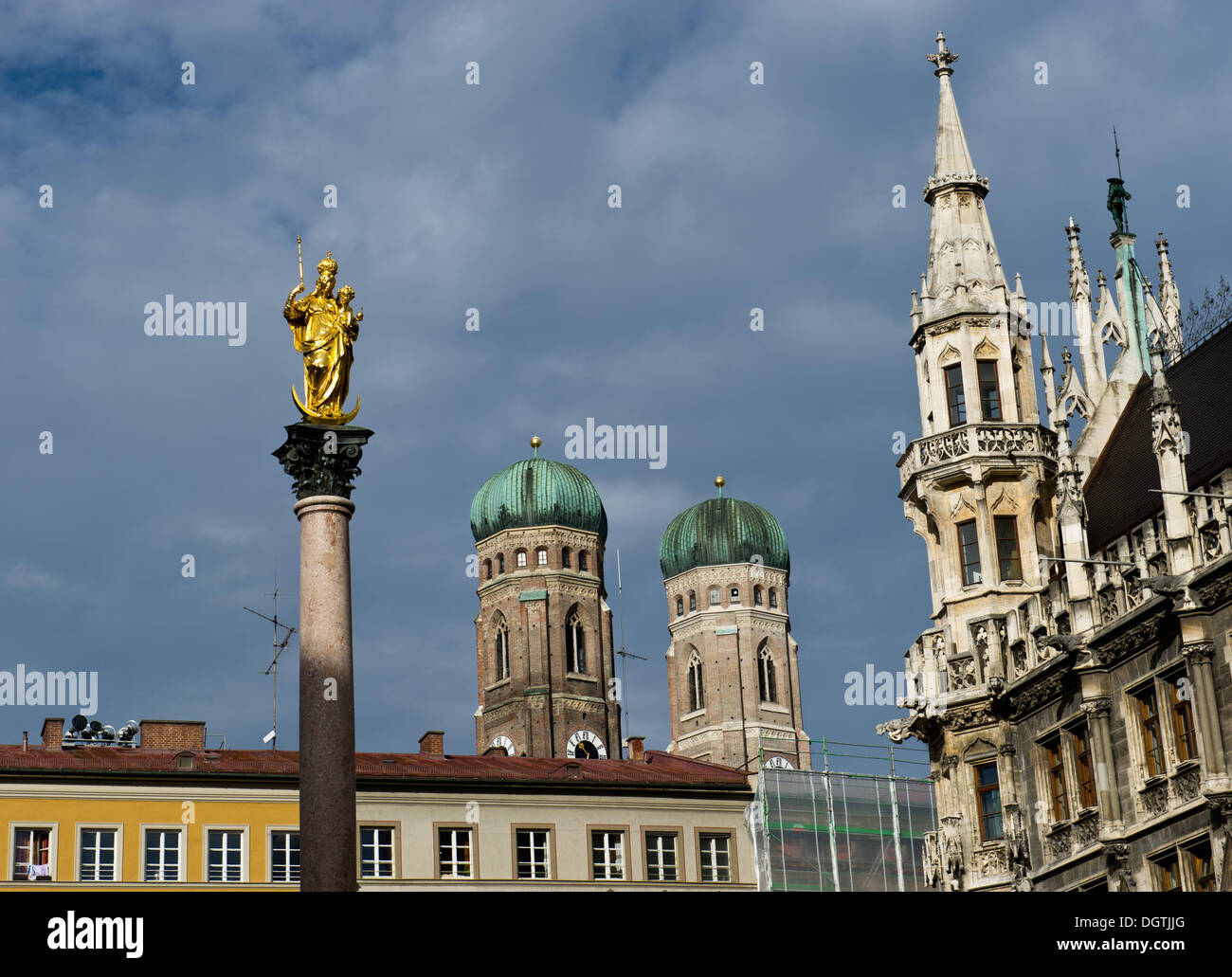 View of the golden Mariensaeule, a Marian column, the Frauenkirche church and the townhall in Munich, Germany, 25 October 2013. Photo: Inga Kjer/dpa Stock Photo
