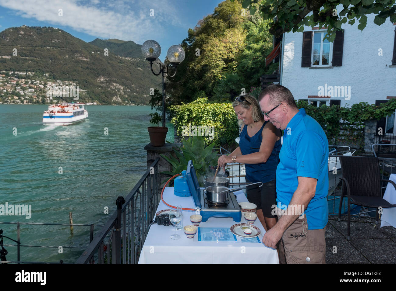 Risotto cookery class at the Grotto San Roco. Caprino. Lake Lugano