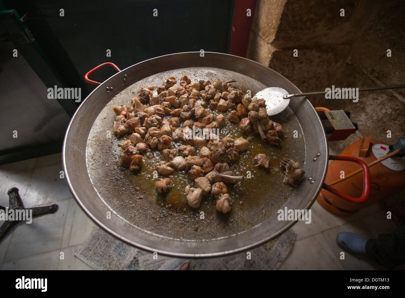 Elaboration of the paella cooking the meat. Valencia Stock Photo Alamy