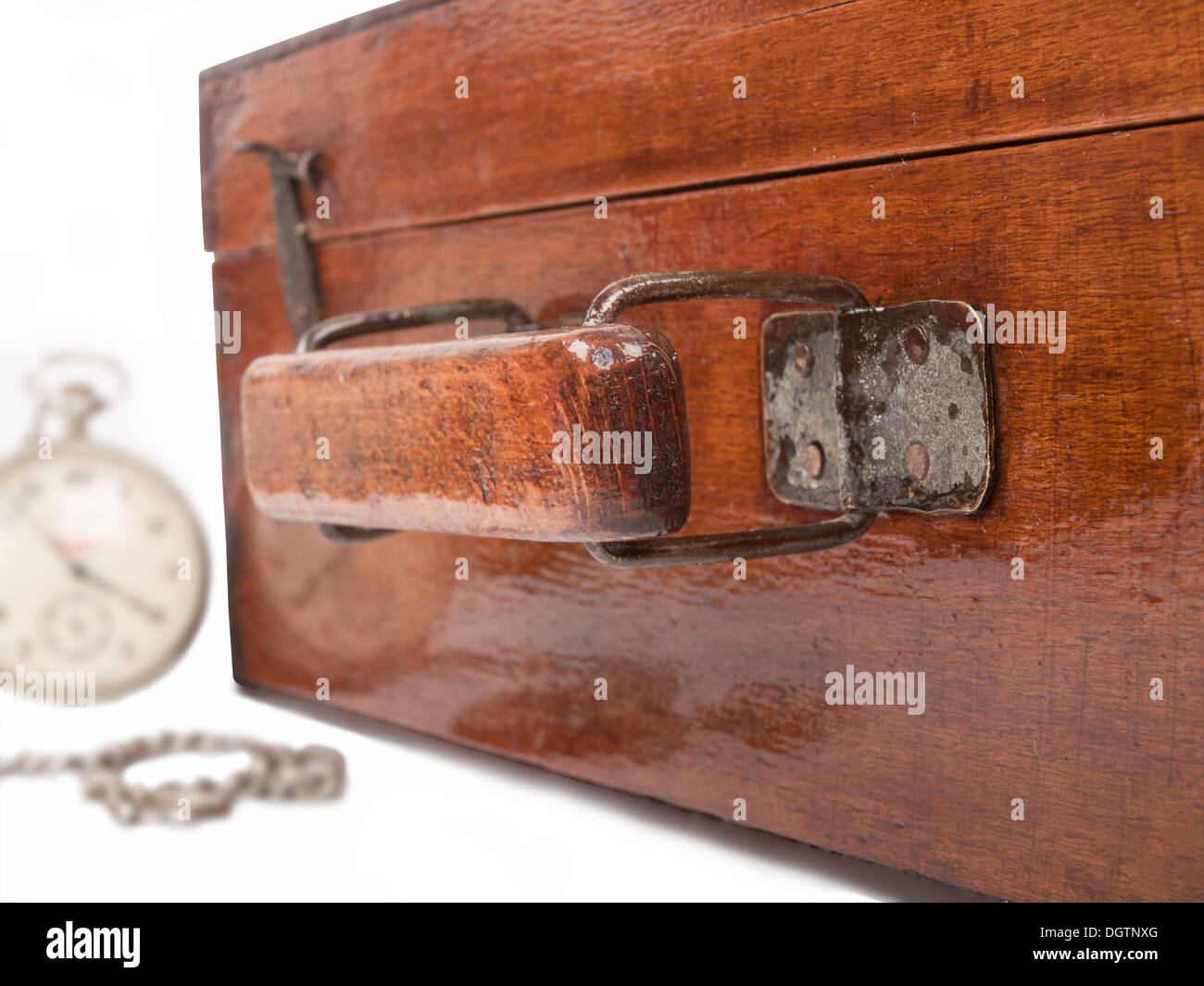 old wooden suitcase and pocket watch Stock Photo