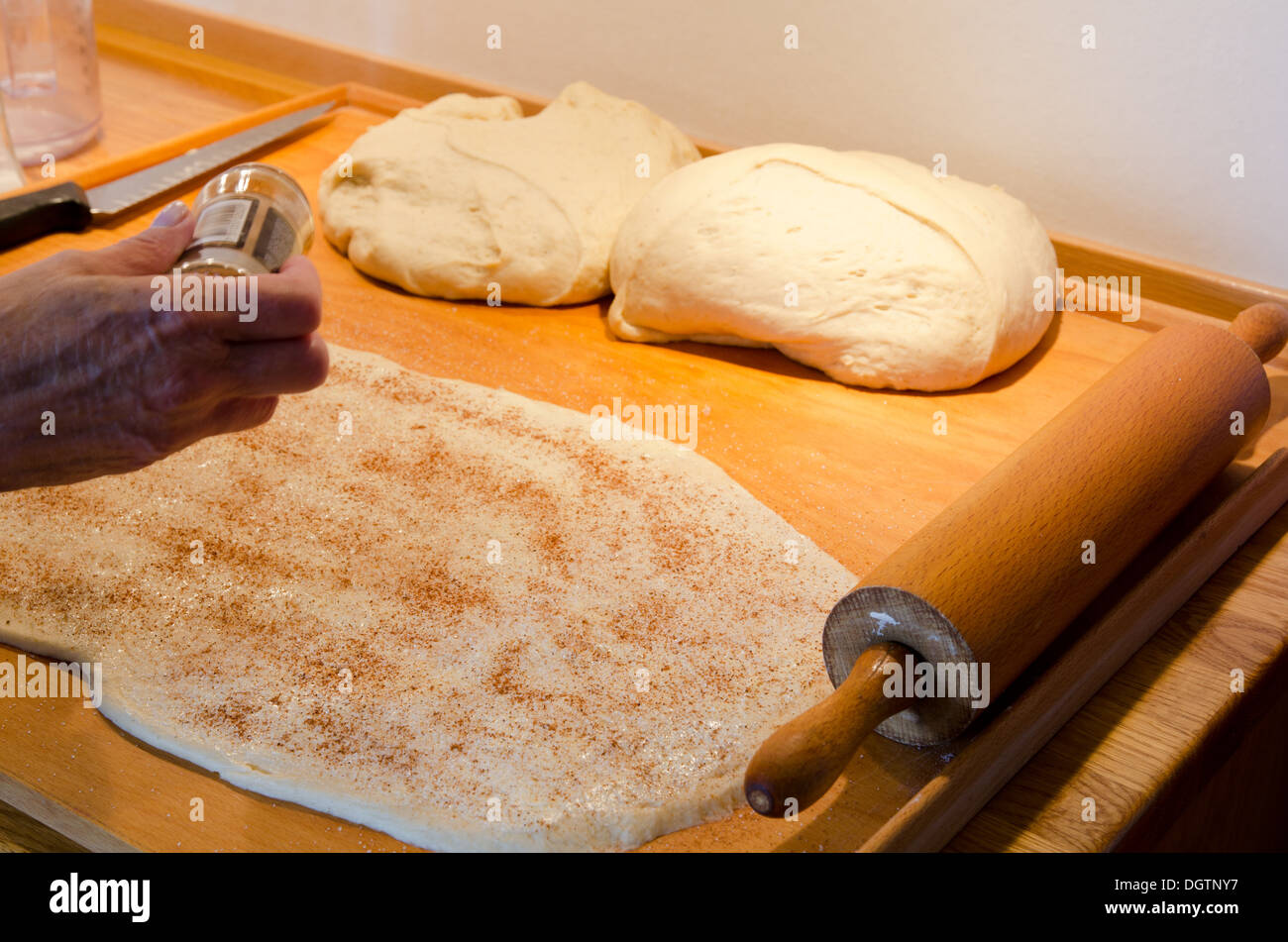 Making cinnamon buns Stock Photo