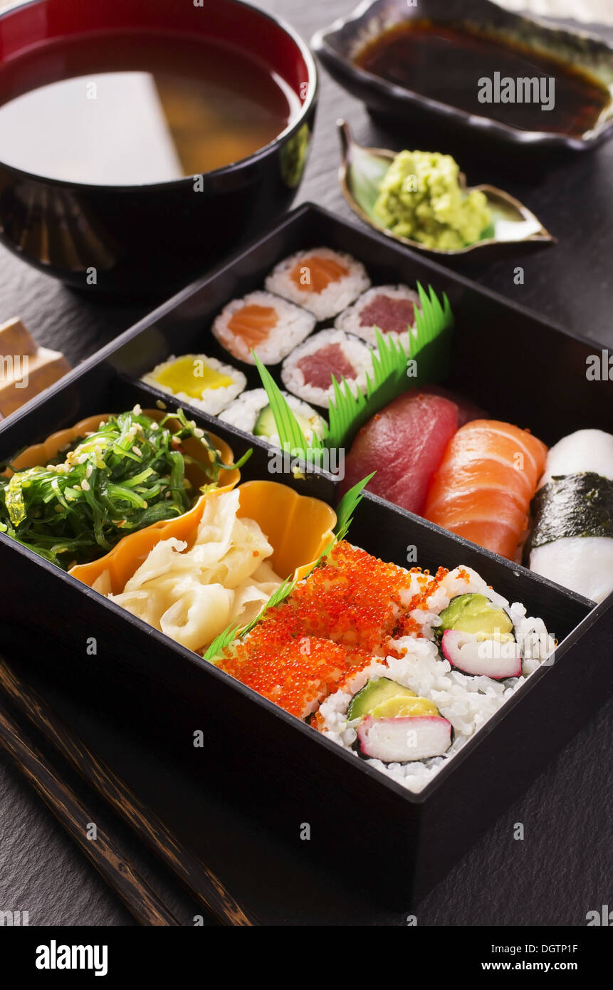 bento box with sushi and rolls Stock Photo Alamy