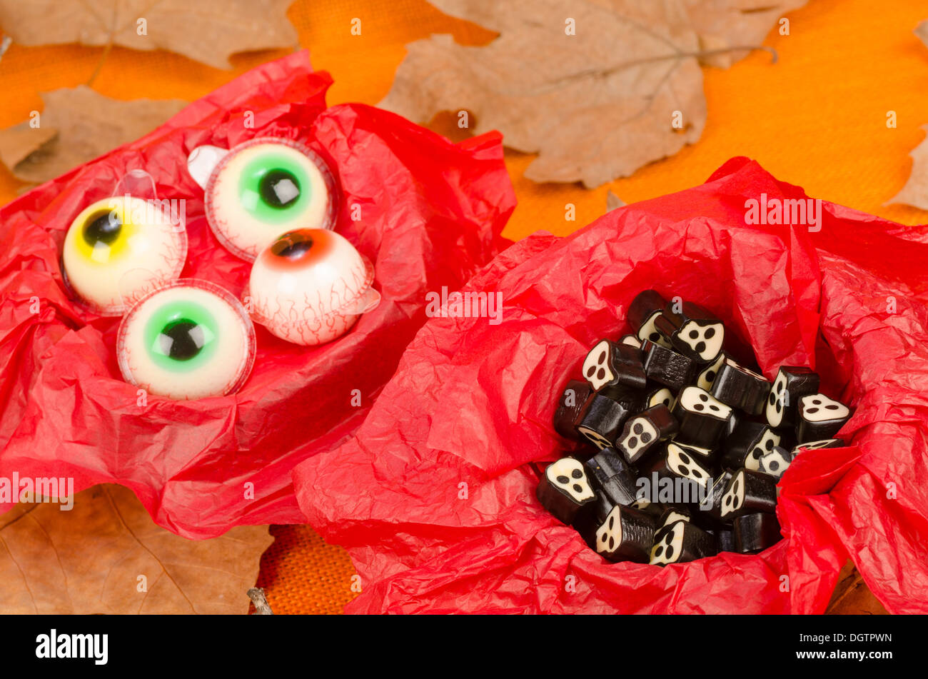Halloween treats coming in spooky shapes, kid party food Stock Photo