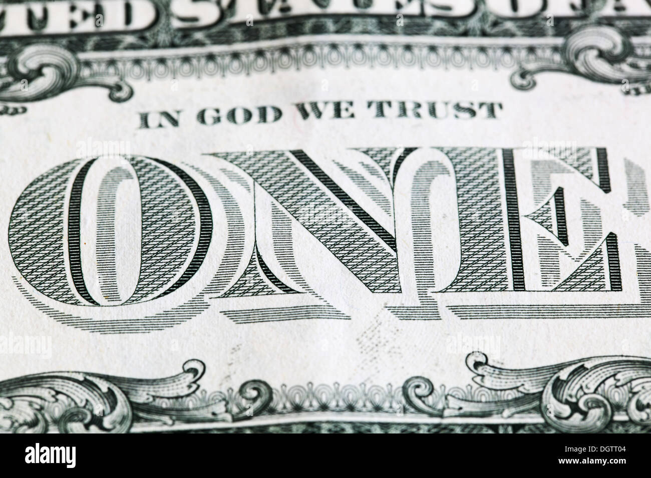 the word 'one' on the dollar bill. close-up photo Stock Photo