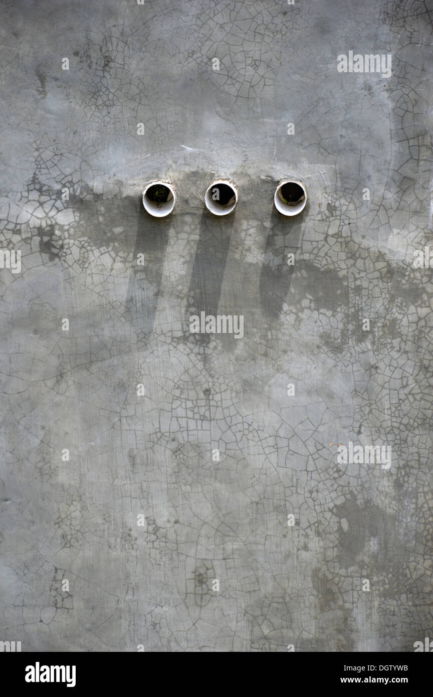 three air holes in the cement wall Stock Photo Alamy