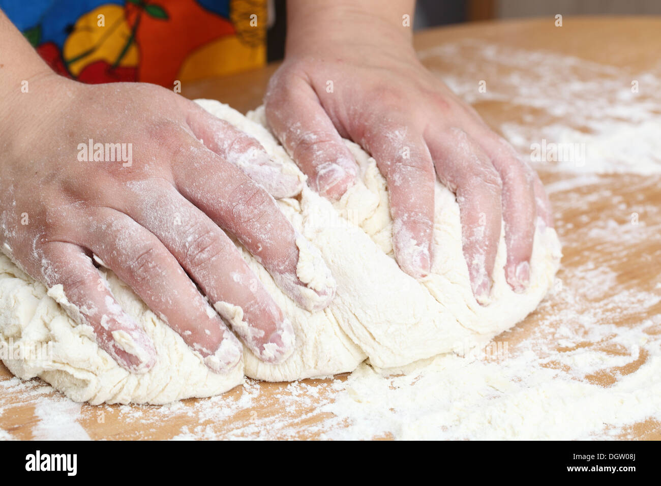 Woman hands knead dough Stock Photo - Alamy