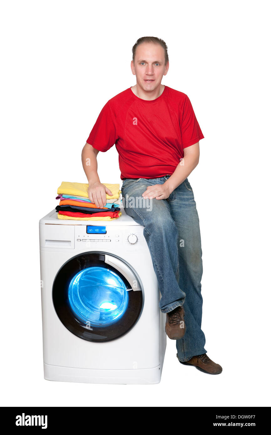 happy man with new washing machine Stock Photo