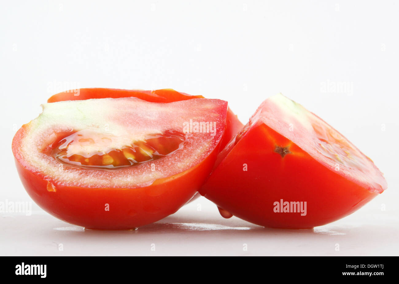 red tomato isolated on white Stock Photo - Alamy