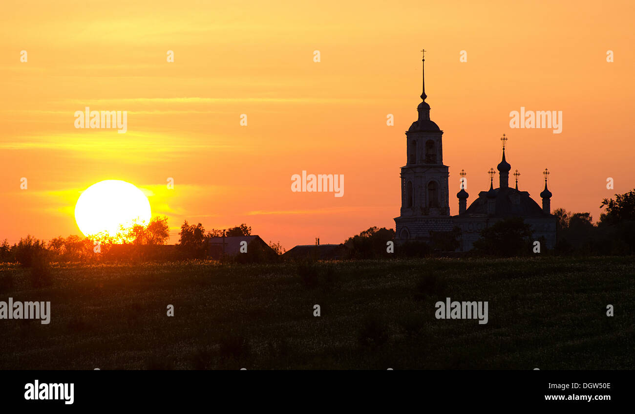 Silhouette of church against a sunset Stock Photo - Alamy
