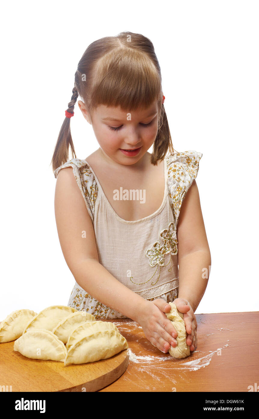 little girl kneading dough Stock Photo Alamy
